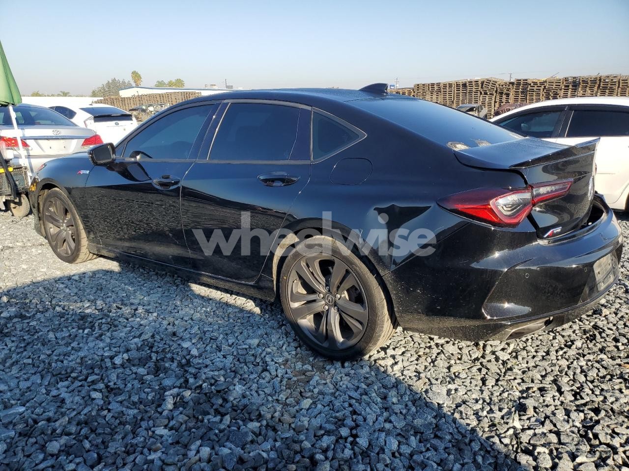 Photo 2 of 2021 ACURA TLX TECH A (VIN 19UUB6F51MA011169)