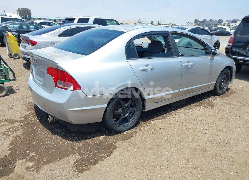 Photo 4 of 2009 Honda Civic LX (VIN 19XFA155X9E005857)