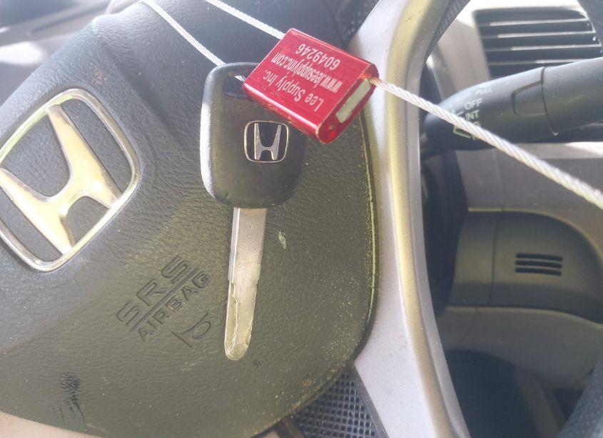 Photo 11 of 2009 Honda Civic VP (VIN 19XFA16339E028605)