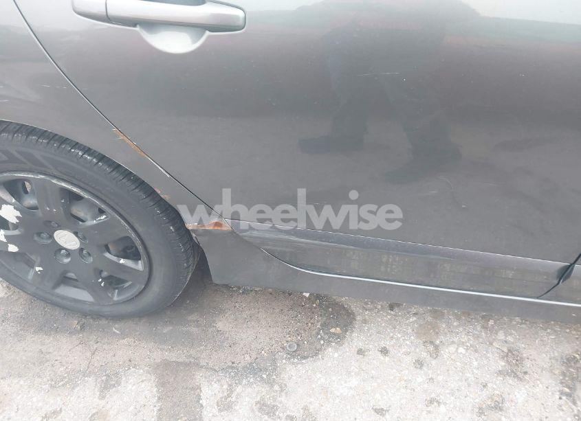 Photo 12 of 2009 Honda Civic LX (VIN 19XFA16569E050955)