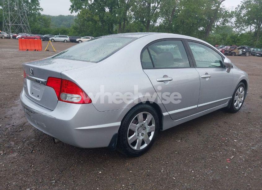 Photo 4 of 2009 Honda Civic LX (VIN 19XFA16599E050724)