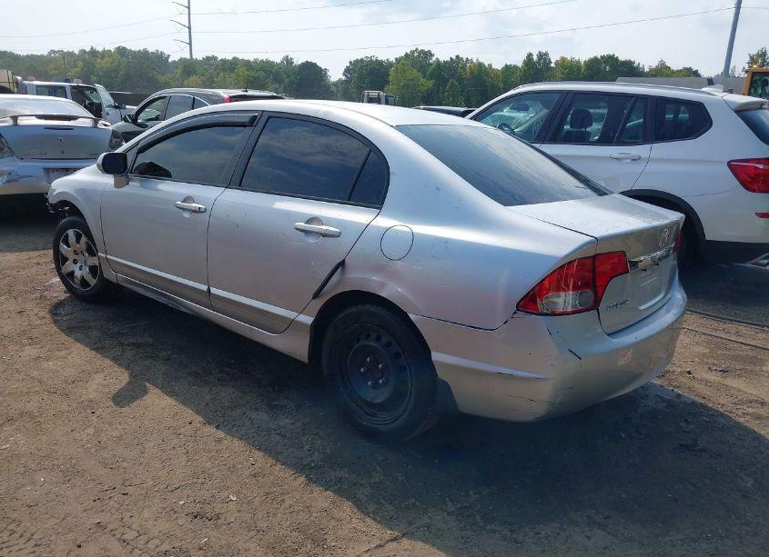 Photo 3 of 2011 Honda Civic LX (VIN 19XFA1E54BE007772)