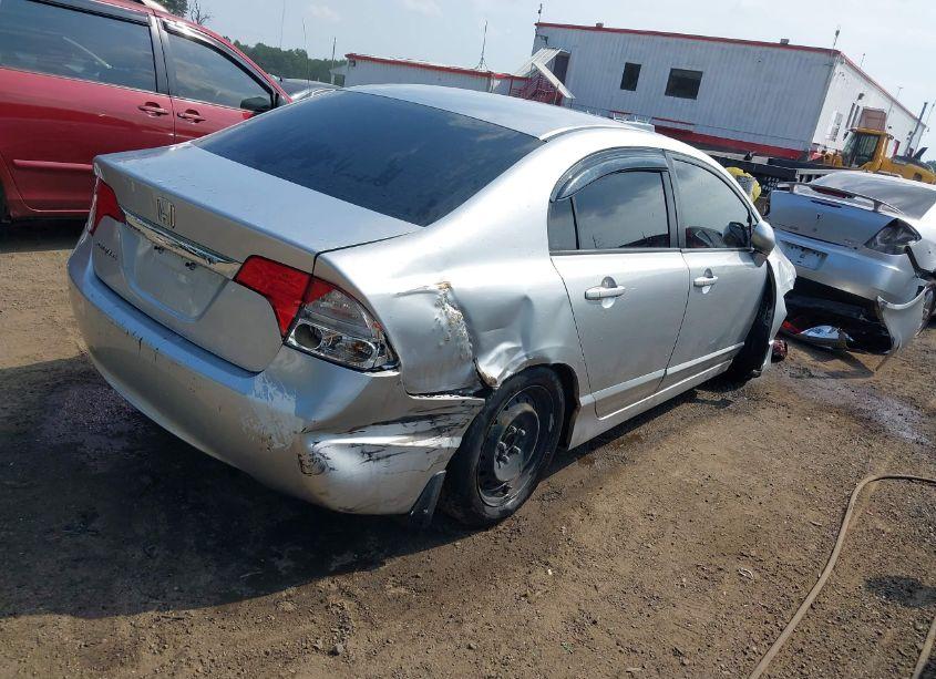 Photo 4 of 2011 Honda Civic LX (VIN 19XFA1E54BE007772)