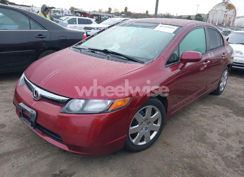 Photo 2 of 2010 Honda Civic LX (VIN 19XFA1F50AE043908)