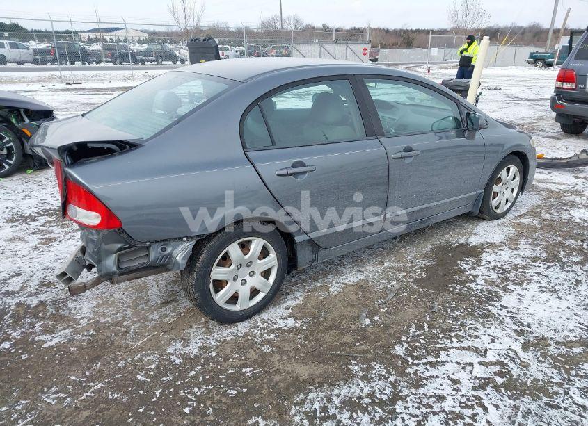 Photo 4 of 2011 Honda Civic LX (VIN 19XFA1F50BE019416)