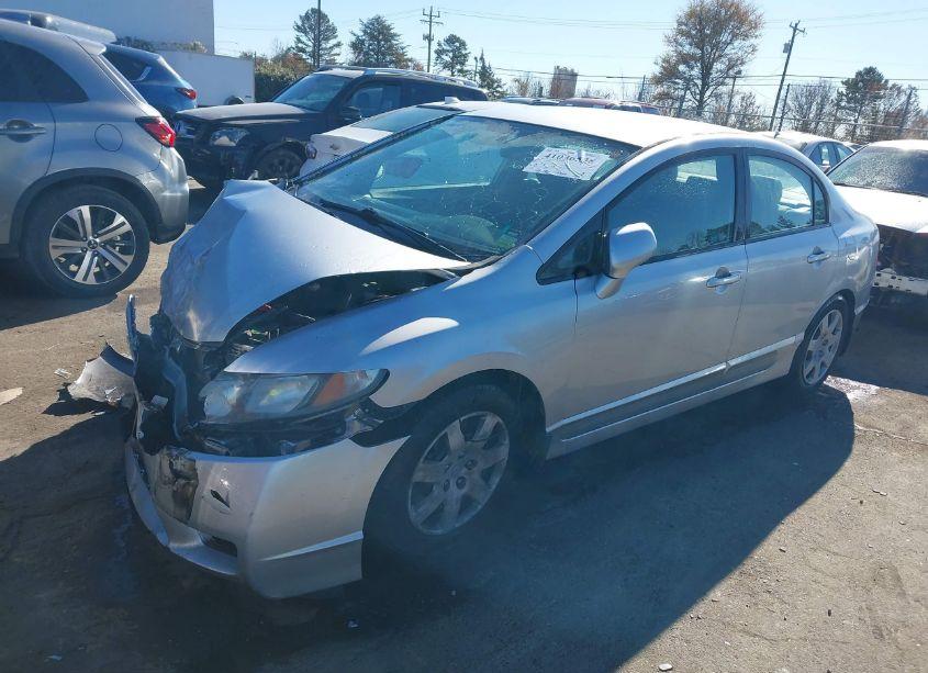 Photo 2 of 2011 Honda Civic LX (VIN 19XFA1F50BE030206)