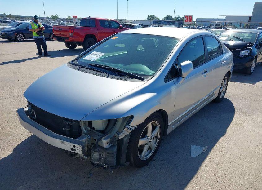 Photo 2 of 2011 Honda Civic LX (VIN 19XFA1F50BE032120)