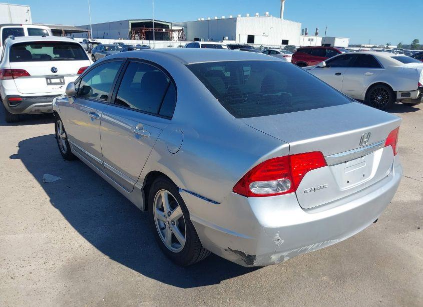 Photo 3 of 2011 Honda Civic LX (VIN 19XFA1F50BE032120)