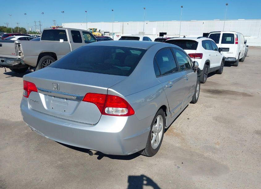 Photo 4 of 2011 Honda Civic LX (VIN 19XFA1F50BE032120)