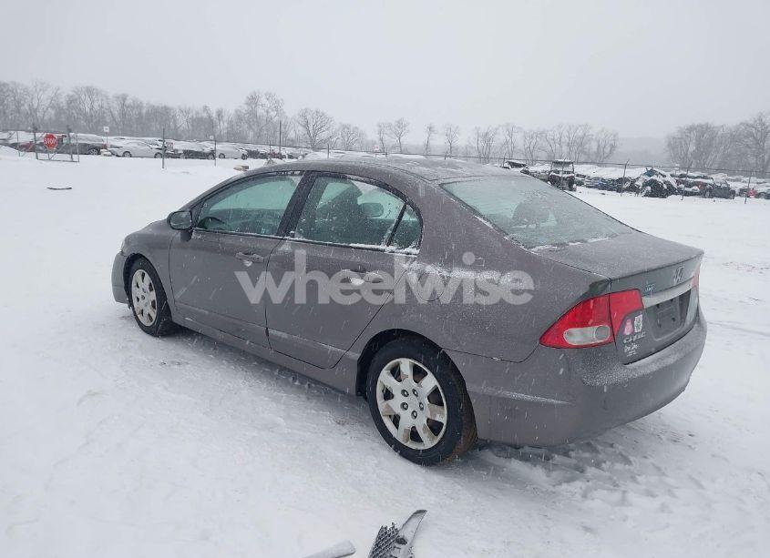 Photo 3 of 2011 Honda Civic LX (VIN 19XFA1F50BE033915)