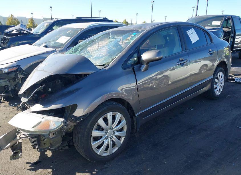 Photo 2 of 2011 Honda Civic LX (VIN 19XFA1F50BE042212)