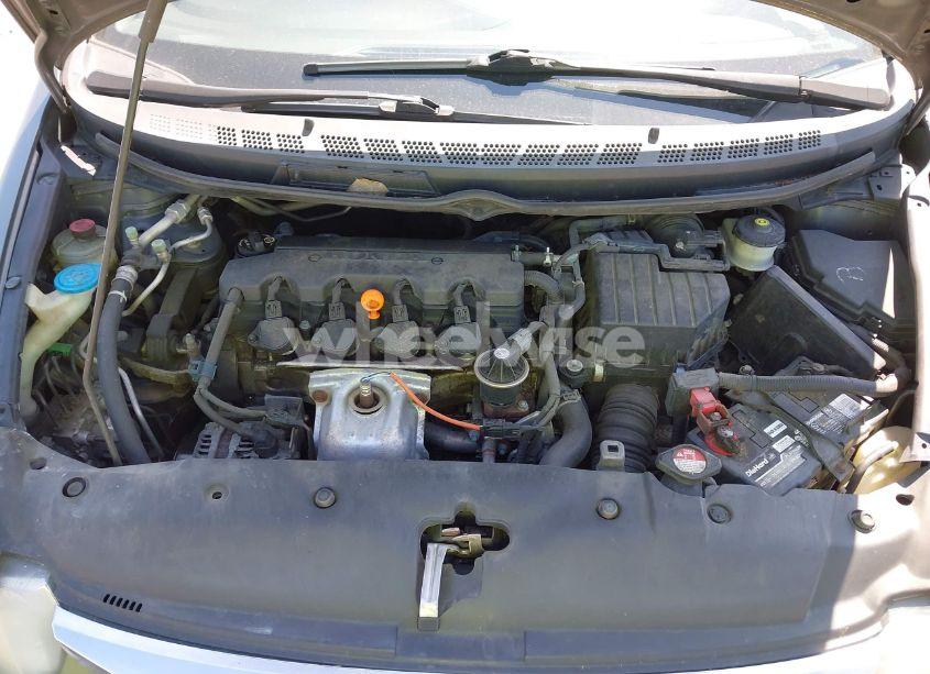 Photo 10 of 2011 Honda Civic LX (VIN 19XFA1F50BE044638)