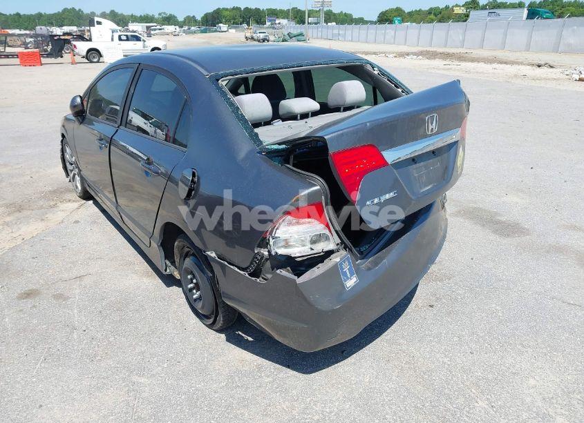 Photo 3 of 2011 Honda Civic LX (VIN 19XFA1F50BE044638)