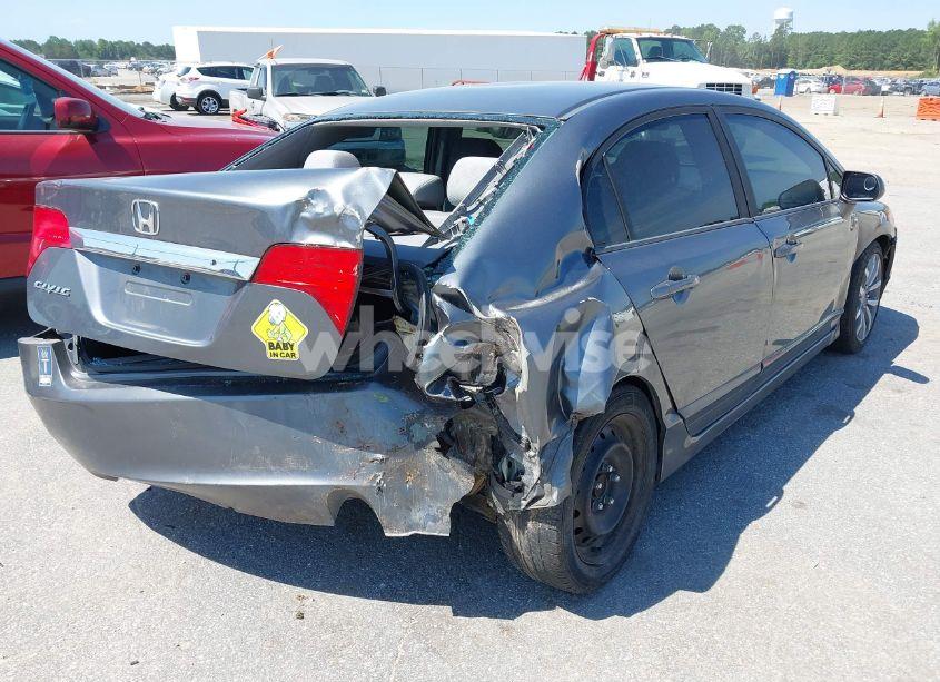 Photo 4 of 2011 Honda Civic LX (VIN 19XFA1F50BE044638)