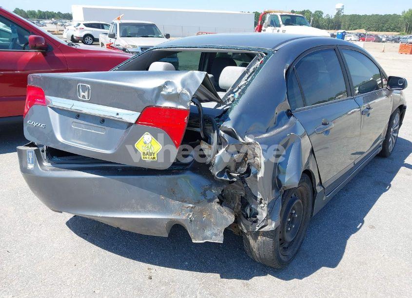 Photo 6 of 2011 Honda Civic LX (VIN 19XFA1F50BE044638)