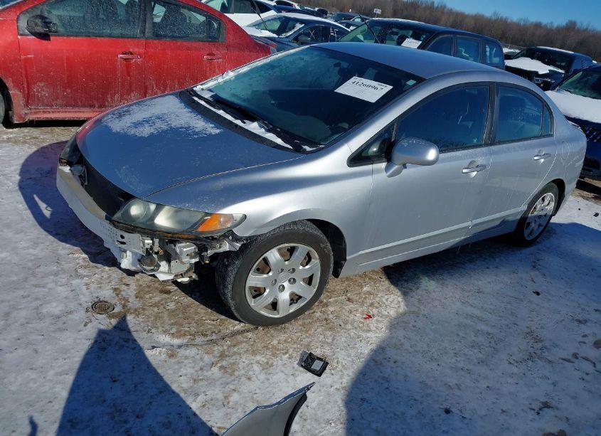 Photo 2 of 2011 Honda Civic LX (VIN 19XFA1F51BE006108)