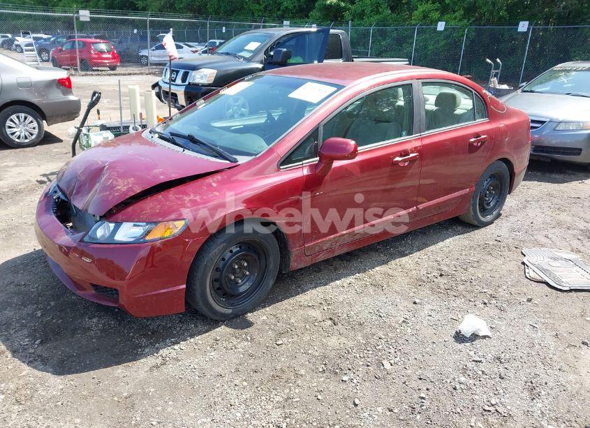 Photo 2 of 2011 Honda Civic LX (VIN 19XFA1F51BE023149)