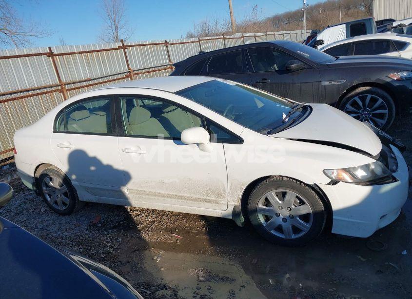 Photo 13 of 2011 Honda Civic LX (VIN 19XFA1F51BE023216)