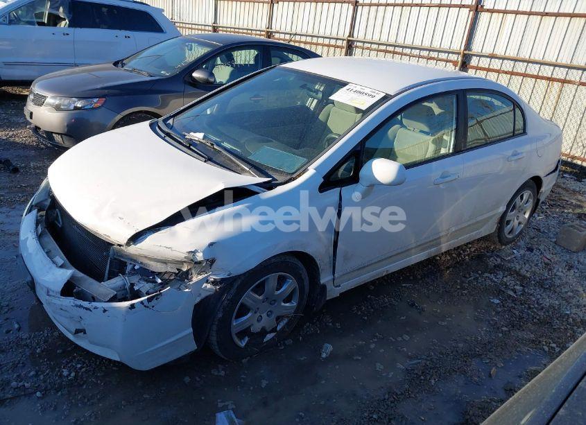 Photo 2 of 2011 Honda Civic LX (VIN 19XFA1F51BE023216)