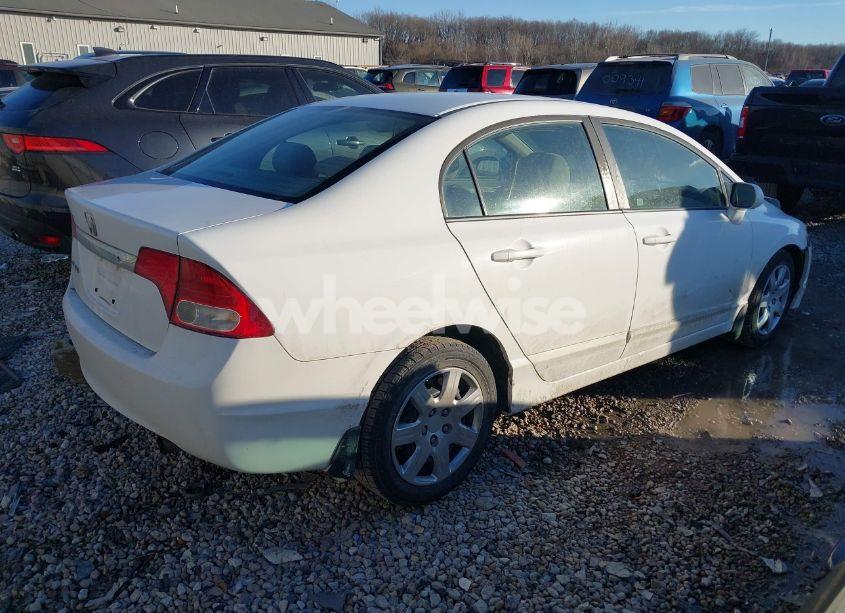 Photo 4 of 2011 Honda Civic LX (VIN 19XFA1F51BE023216)