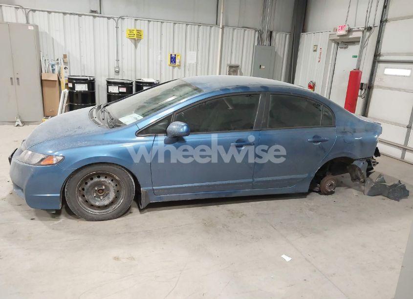 Photo 14 of 2011 Honda Civic LX (VIN 19XFA1F51BE036208)
