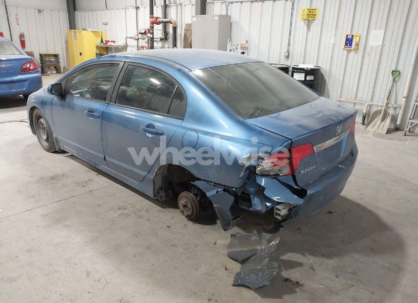 Photo 3 of 2011 Honda Civic LX (VIN 19XFA1F51BE036208)