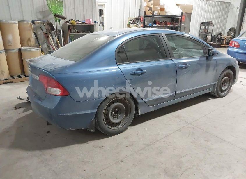 Photo 4 of 2011 Honda Civic LX (VIN 19XFA1F51BE036208)