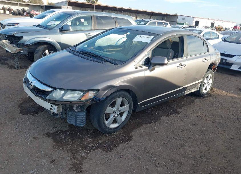 Photo 2 of 2011 Honda Civic LX (VIN 19XFA1F51BE038122)