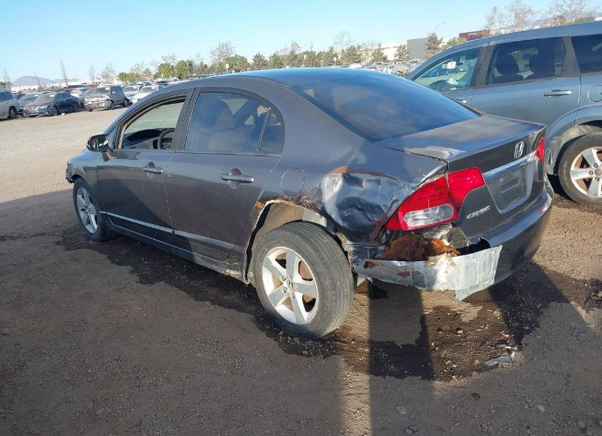 Photo 3 of 2011 Honda Civic LX (VIN 19XFA1F51BE038122)