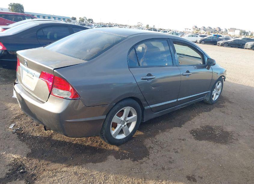 Photo 4 of 2011 Honda Civic LX (VIN 19XFA1F51BE038122)