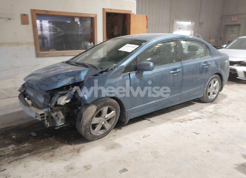 Photo 2 of 2011 Honda Civic LX (VIN 19XFA1F51BE046768)