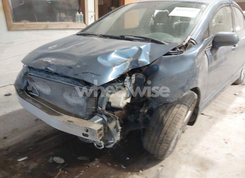 Photo 6 of 2011 Honda Civic LX (VIN 19XFA1F51BE046768)