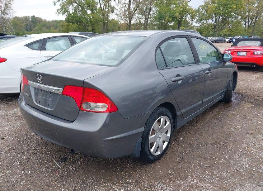 Photo 4 of 2011 Honda Civic LX (VIN 19XFA1F52BE007560)