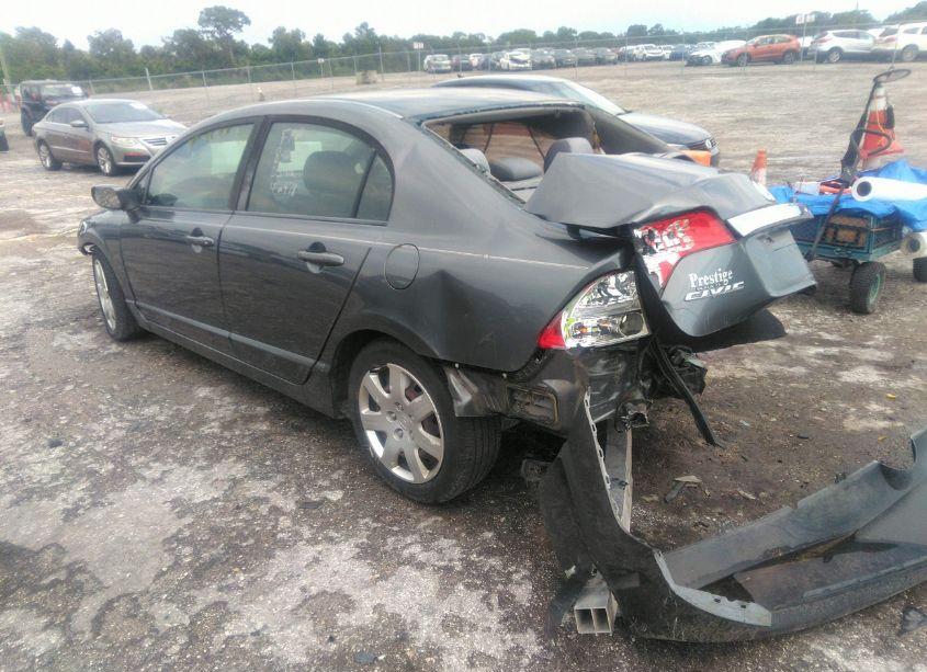 Photo 3 of 2011 Honda Civic LX (VIN 19XFA1F52BE008773)