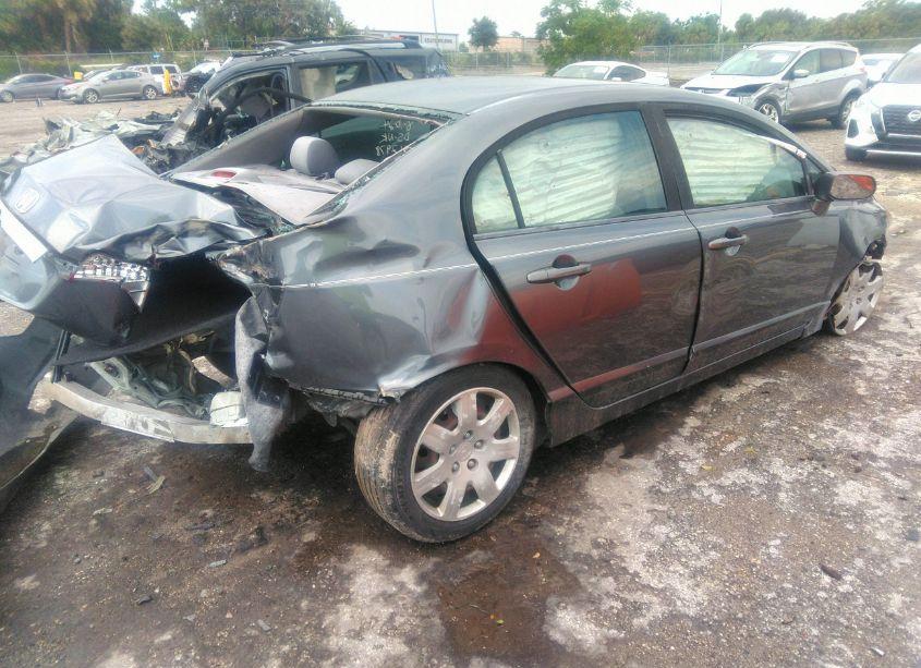 Photo 4 of 2011 Honda Civic LX (VIN 19XFA1F52BE008773)