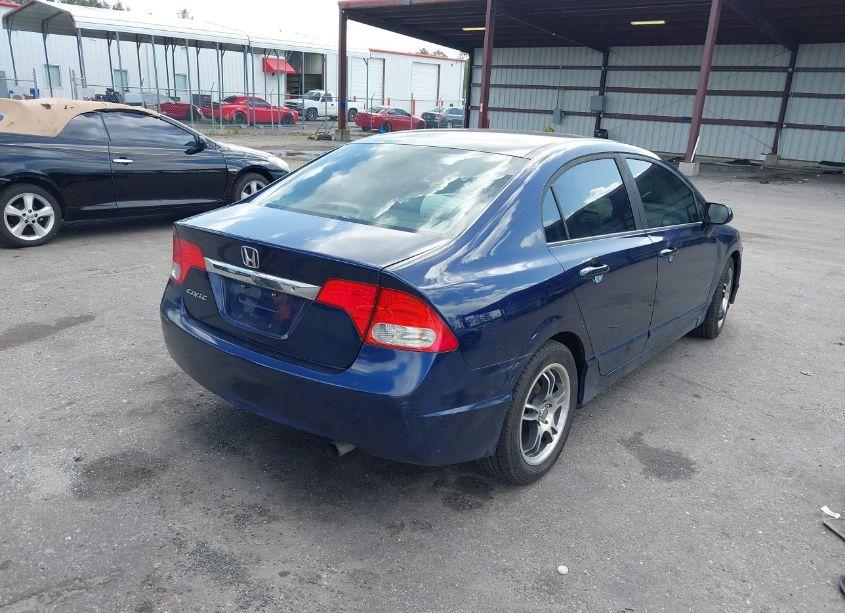 Photo 4 of 2011 Honda Civic LX (VIN 19XFA1F52BE010359)