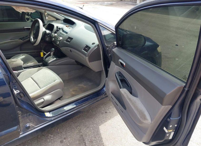 Photo 5 of 2011 Honda Civic LX (VIN 19XFA1F52BE010359)