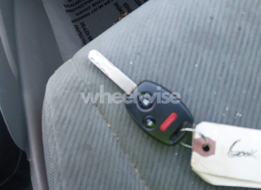 Photo 11 of 2011 Honda Civic LX (VIN 19XFA1F52BE010586)