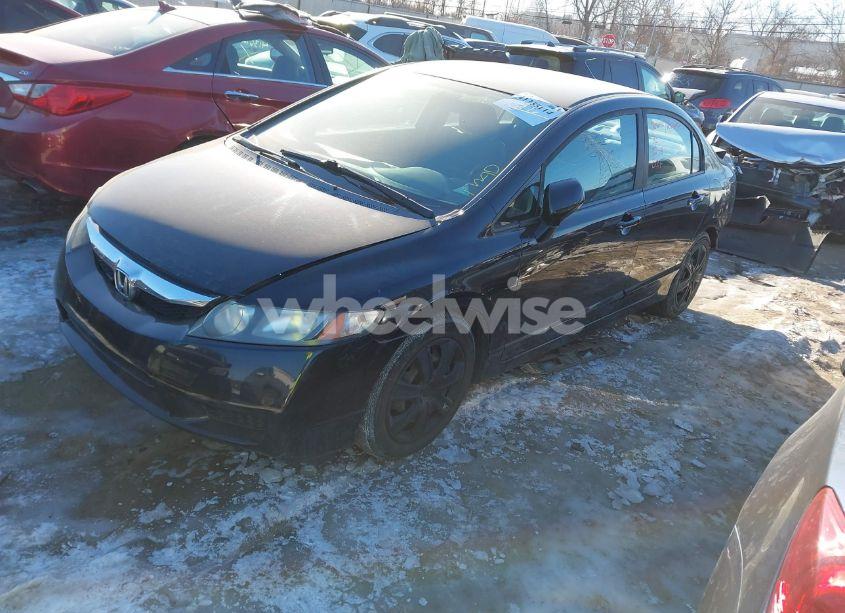 Photo 2 of 2011 Honda Civic LX (VIN 19XFA1F52BE010586)