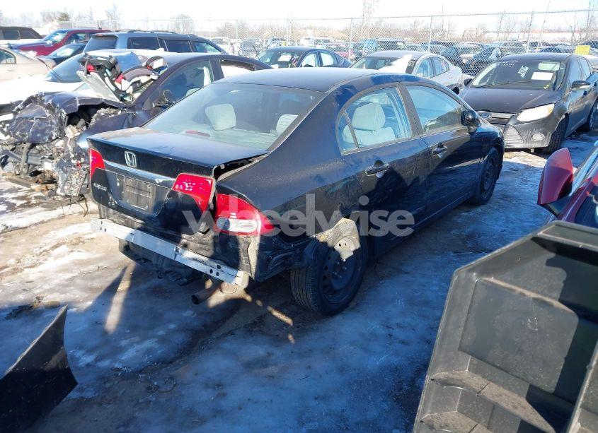 Photo 4 of 2011 Honda Civic LX (VIN 19XFA1F52BE010586)