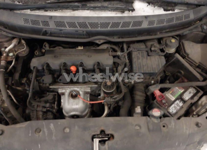 Photo 10 of 2011 Honda Civic LX (VIN 19XFA1F52BE016825)