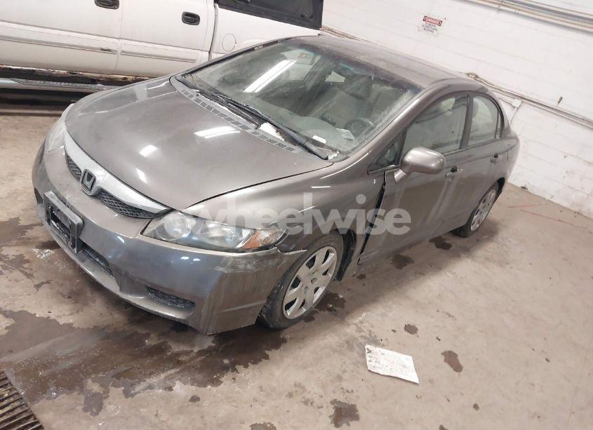 Photo 2 of 2011 Honda Civic LX (VIN 19XFA1F52BE016825)