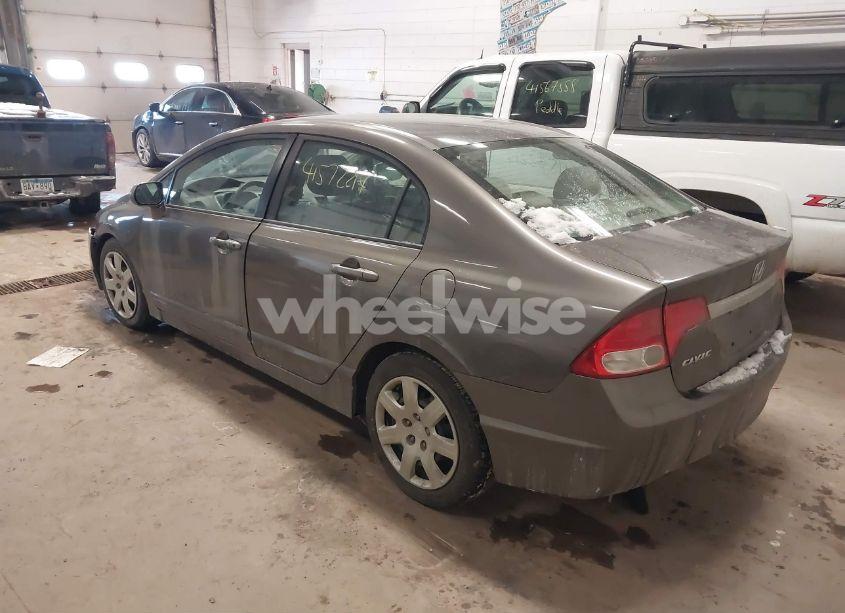 Photo 3 of 2011 Honda Civic LX (VIN 19XFA1F52BE016825)