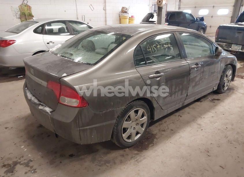 Photo 4 of 2011 Honda Civic LX (VIN 19XFA1F52BE016825)