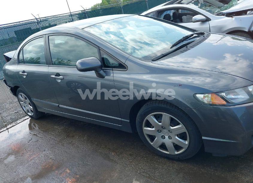 Photo 13 of 2011 Honda Civic LX (VIN 19XFA1F52BE025928)
