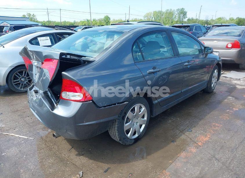 Photo 4 of 2011 Honda Civic LX (VIN 19XFA1F52BE025928)