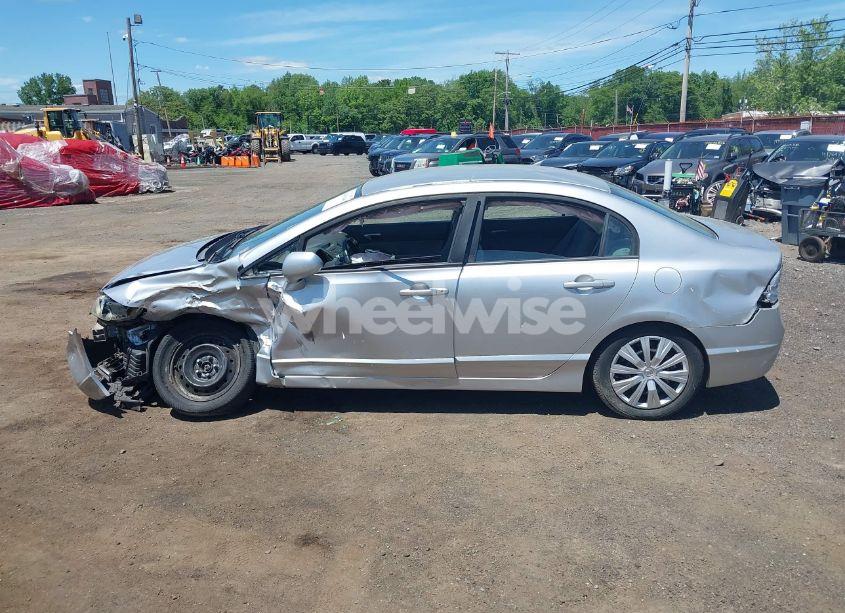 Photo 14 of 2011 Honda Civic LX (VIN 19XFA1F52BE038856)