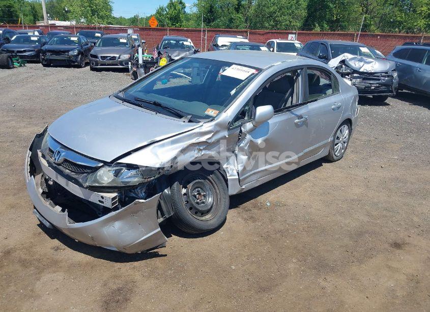 Photo 2 of 2011 Honda Civic LX (VIN 19XFA1F52BE038856)