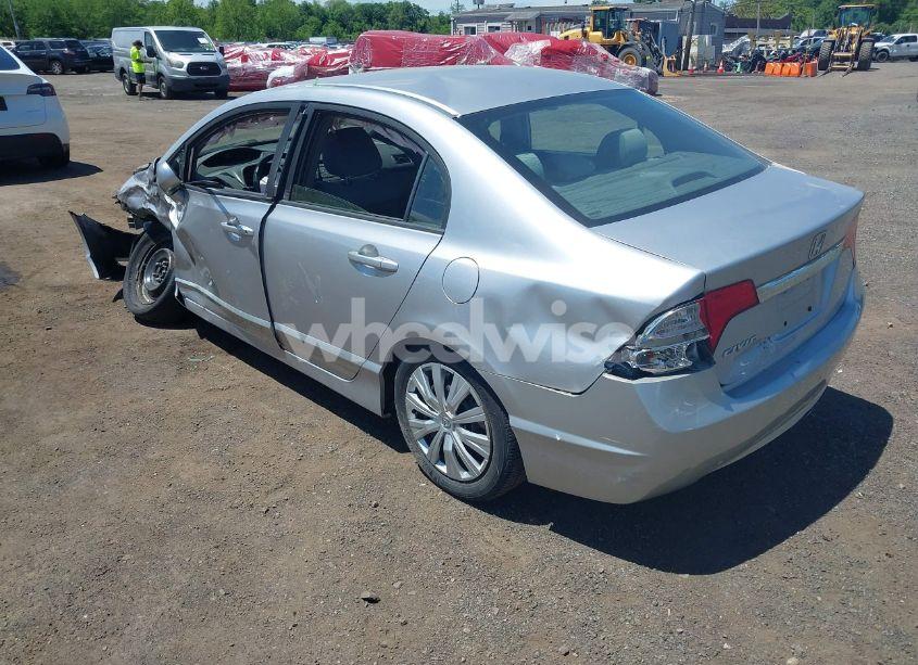 Photo 3 of 2011 Honda Civic LX (VIN 19XFA1F52BE038856)
