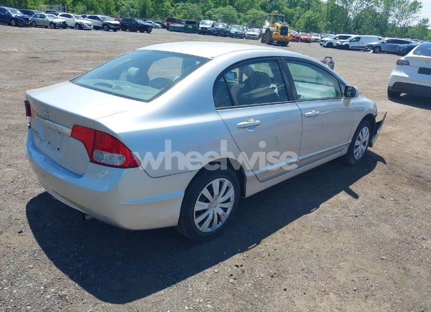 Photo 4 of 2011 Honda Civic LX (VIN 19XFA1F52BE038856)